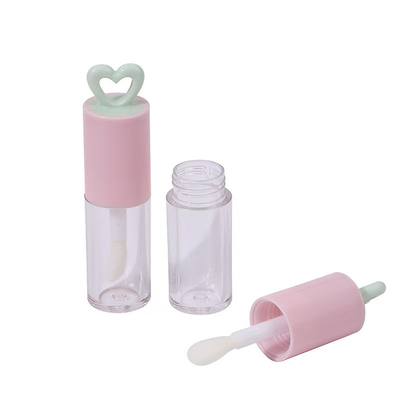 สีที่กําหนดเอง 7ml หัวใจโฮโล พลาสติก ท่อกระจกริมฝีปากสําหรับบรรจุกระจกริมฝีปากแบบพกพา