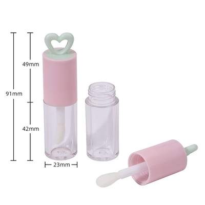 สีที่กําหนดเอง 7ml หัวใจโฮโล พลาสติก ท่อกระจกริมฝีปากสําหรับบรรจุกระจกริมฝีปากแบบพกพา